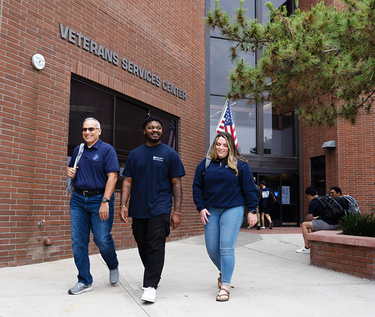 Veterans students walking outside 