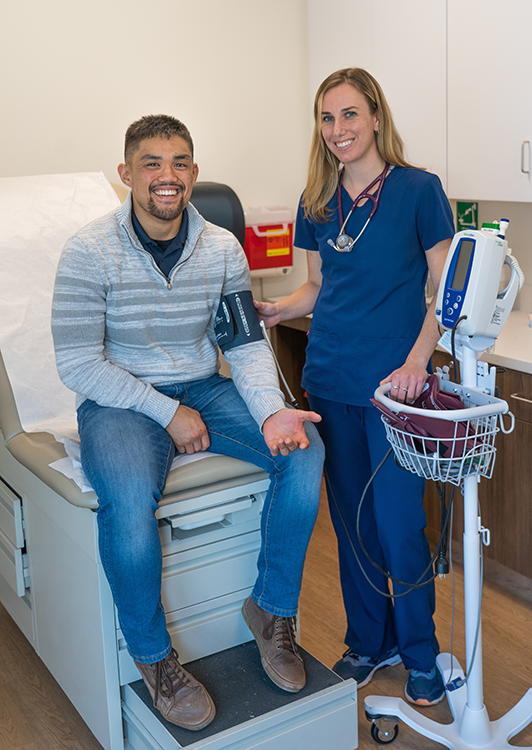 Nurse taking blood pressure 