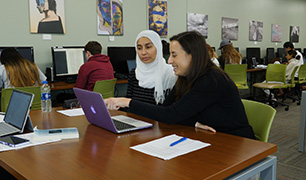 Writing Center faculty with student